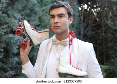 Elegant Male Roller Skater Wearing White Suit