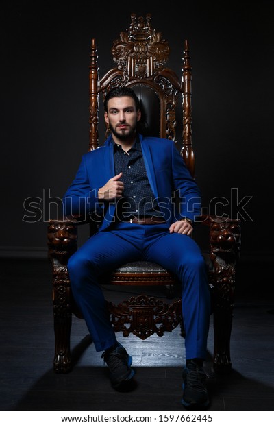 Elegant Man Classic Blue Suit Sitting Stock Photo (Edit Now) 1597662445