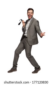 Elegant Man In Grey Suit Dancing On White Background