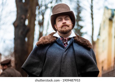 Elegant man of the nineteenth century. Vintage. in classic retro clothes, coat and hat.