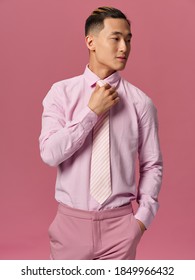 elegant man pink shirt tie attractive look fashion cropped view pink background model