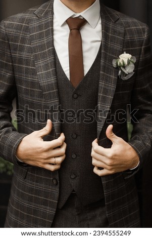 Similar – Man in suit wearing a bowtie