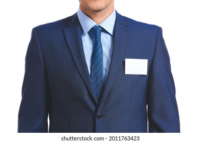 Elegant Man In Suit With Blank Badge On White Background