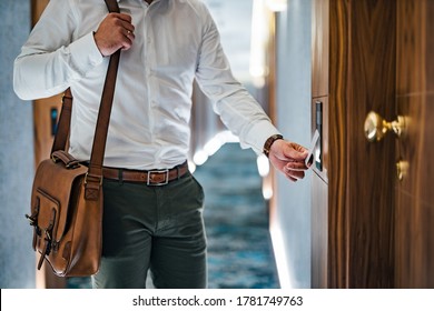 Elegant Man Unlocking Hotel Room Door With Key Card, Close-up.