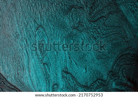 Elegant marble cyan background,make from liquid nail polishes.Good as cosmetics backdrop.