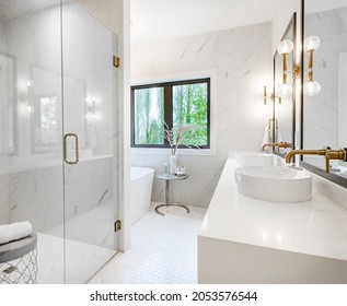 Elegant Master Bedroom And Bathroom With White Furnishings Glass Shower Make Up Counter And Pillows