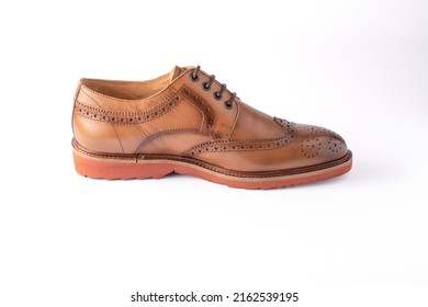 Elegant men's shoe in brown leather, isolated on a white background