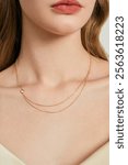 Elegant Minimalist Gold Double-Layered Necklace with Heart Pendant - Perfect for Chic and Sophisticated Jewelry Lovers.