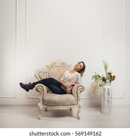 
Elegant Model Sitting In Chair Posing Like A Queen
Young Stylish Model In Casual Style Posing In Studio.