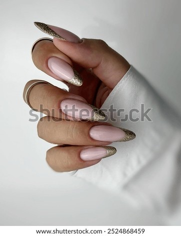 Elegant and more artistic Nail art design in young women's hand. Fruit and flowers designs on nails