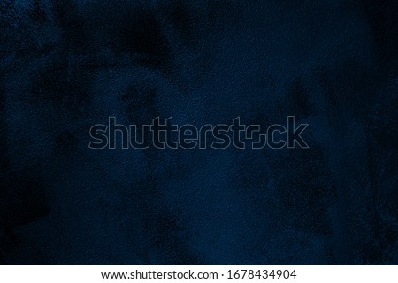 Elegant navy blue colored dark Concrete textured cool grunge abstract background with roughness and irregularities. 2020 color trend concept.
