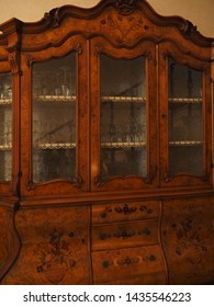 Elegant old cupboard, contains crystal glasses.