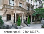 Elegant old townhouses or apartment buildings in French Beaux-Arts style in Upper East Side area of Manhattan historic district