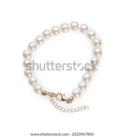 Elegant pearl bracelet isolated on white, top view