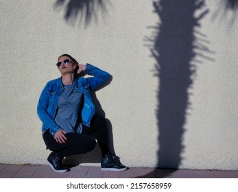 An Elegant Picture Of A Young Spanish Woman In An Urban Fashion Shoot