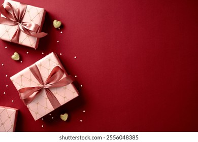 Elegant pink gift boxes with satin ribbons on a red background, surrounded by heart-shaped confetti and golden heart decorations. Perfect for Valentine's Day or romantic celebrations - Powered by Shutterstock