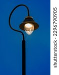 An elegant and practical source of light, a street light illuminates the darkness, adds a touch of ambiance to the surroundings, and enhances the safety and convenience of urban areas.