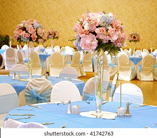 Elegant Reception Hall Set With Flowers For A Beautiful Wedding