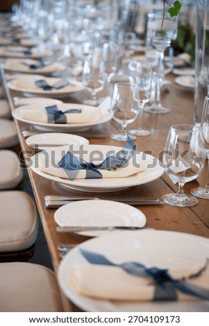 Elegant Reception Table Setting with Navy Ribbon and Lavender