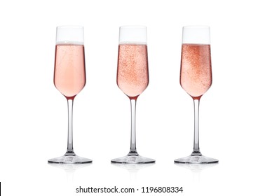 Elegant Rose Pink Champagne Glasses With Bubbles  On White Background With Reflection