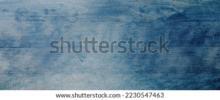 Elegant sapphire blue background with white hazy top border and dark black grunge texture bottom border, luxury blue design