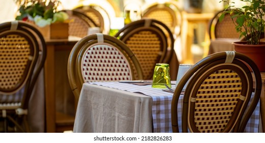 An Elegant Set Table Outside A Venetian Restaurant