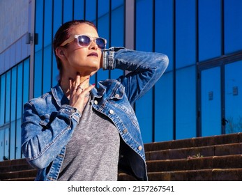 An Elegant Shot Of A Young Woman In Urban Fashion Shoot