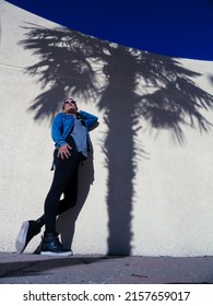 An Elegant Shot Of A Young Woman In Urban Fashion Shoot