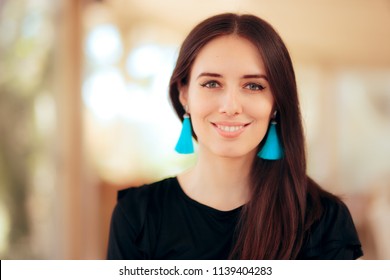 Elegant Smiling Girl Wearing Blue Tassel Fringe Earrings. Beautiful fashion woman wearing trendy jewelry and makeup
 - Powered by Shutterstock