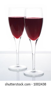 Elegant Sparkling Red Wine Served In Champagne Flutes