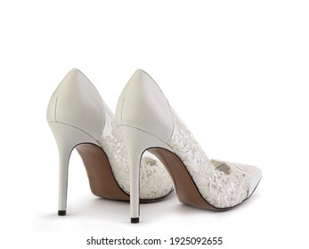 Elegant And Stylish Wedding High-heeled Women Shoes. Shoes On High Heels With Beautiful Lace Details And Silver Glitters. Isolated Close-up On White Background. Back Side View. Fashion Shoes.