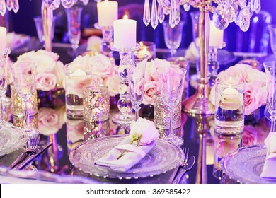 Elegant Table Set For An Event Party Or Wedding Reception, In Purple Light