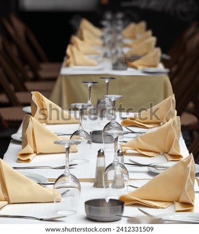 Similar – Image, Stock Photo Elegant table setting in top view with ceramic dishes