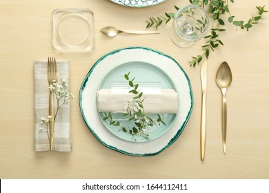 Elegant Table Setting With Flowers And Leaves, Flat Lay