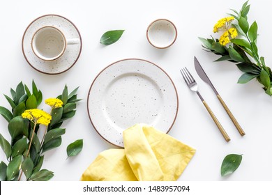 Elegant Table Setting With Plates And Tableware On White Background Top View