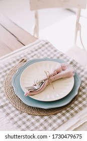 Elegant Table Setting, Top View. Table Set For Fine Dining With Cutlery, Metal Fork And Linen Napkins On Beautiful Plate. Home Decor Rustic Table Setting