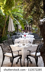 Elegant Tables Setting At Outside Dining Area Of Restaurant.