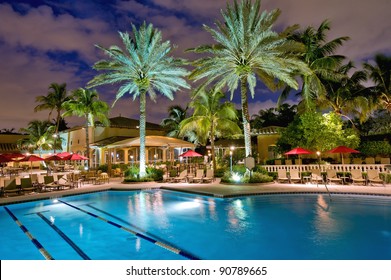 Elegant Tropical Pool And Patio At Night