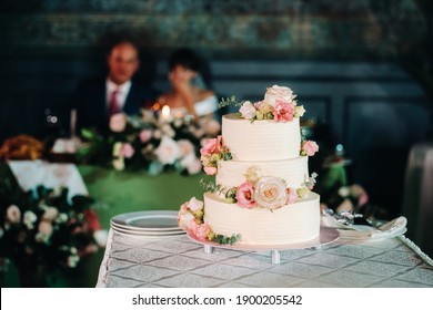 Elegant wedding cake at the wedding in three tiers. - Powered by Shutterstock