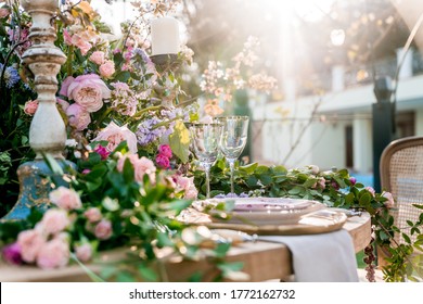 An Elegant Wedding Table Setting In The Garden.