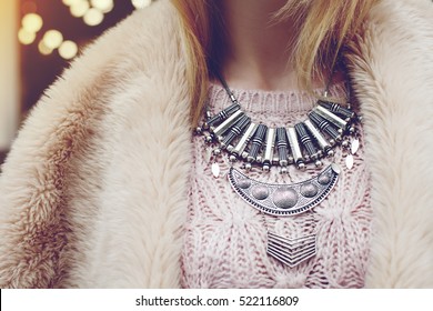 Elegant Winter Outfit. Close Up Of Massive Necklace. Boho Style. Fashionable Girl On The Street. Female Fashion. City Lifestyle. Toned