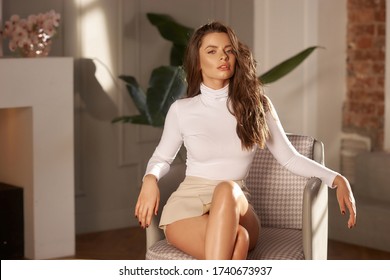 Hot Russian girl in Miniskirt Sit Pops Balloons