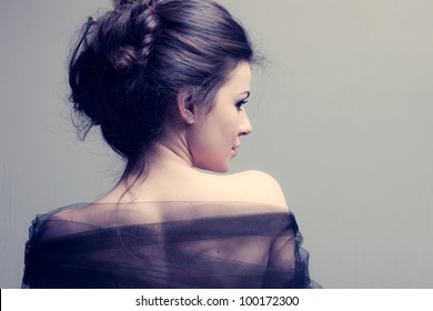 Elegant Woman With Bun, Back View Profile, Studio Shot