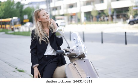 Elegant woman in business attire takes a break on a motor scooter, enjoying a moment of leisure in the city. - Powered by Shutterstock