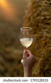 Elegant Woman Holding Glass With White Wine