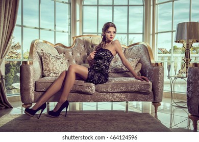 Elegant Woman In A Short Cocktail Dress