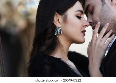 Elegant Woman Touching Face Of Man