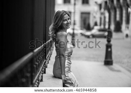 Similar – Image, Stock Photo Smiling girl with a hat pulling from her boyfriend hand in the street to take a walk.