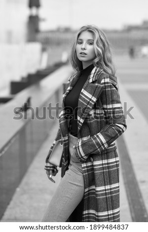 Similar – fashion autumn portrait of young happy woman walking outdoor