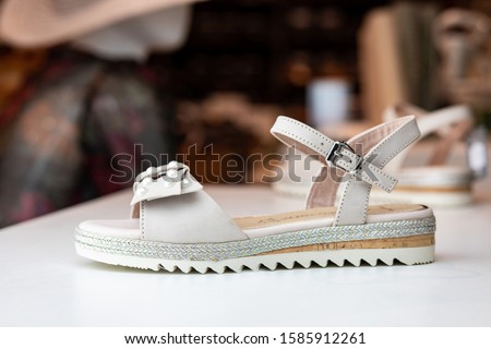 Elegant women shoes close up product photography. Fashion leather women wear. Blured background, isolated product. Profesional lightning.